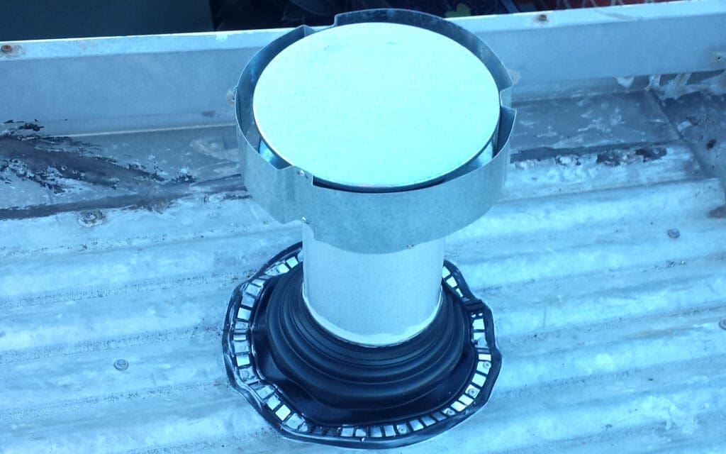 The newly installed flue venting directly outside