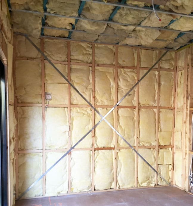 Bradford wall batts installed in exposed timber frame wall